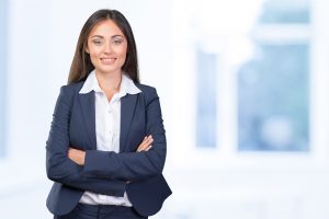 Business Woman Smiling crossed arms pose